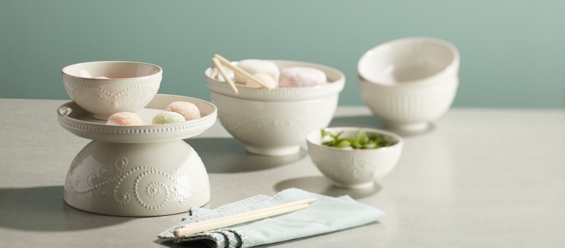 Assorted mochi in white ceramic bowls