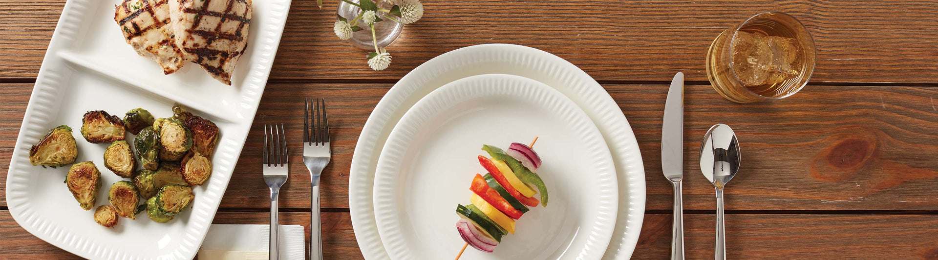 Profile white dinnerware with barbeque skewers