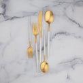 Mazzy Gold Satin White Pom Handle 20-Piece Flatware Set